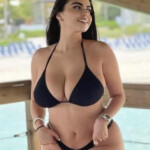 hot black haired babe in swimsuit - www.baconboobsbeer.com